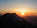 Die orange Sonne - links die Kammspitze