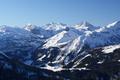 Blick ber das Almgebiet zwischen Vordergnadenalm und Hintergnadenalm (am unteren Bildrand) zu Spirzinger und Spateck (in Bildmitte). Dahinter einige der bekanntesten Gipfel der Radstdter Tauern um Mosermandl und Faulkogel.