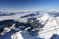 Ausblick vom Sky Walk nach Westen ber das nebelverhangene, obere Ennstal in die Hohen Tauern.